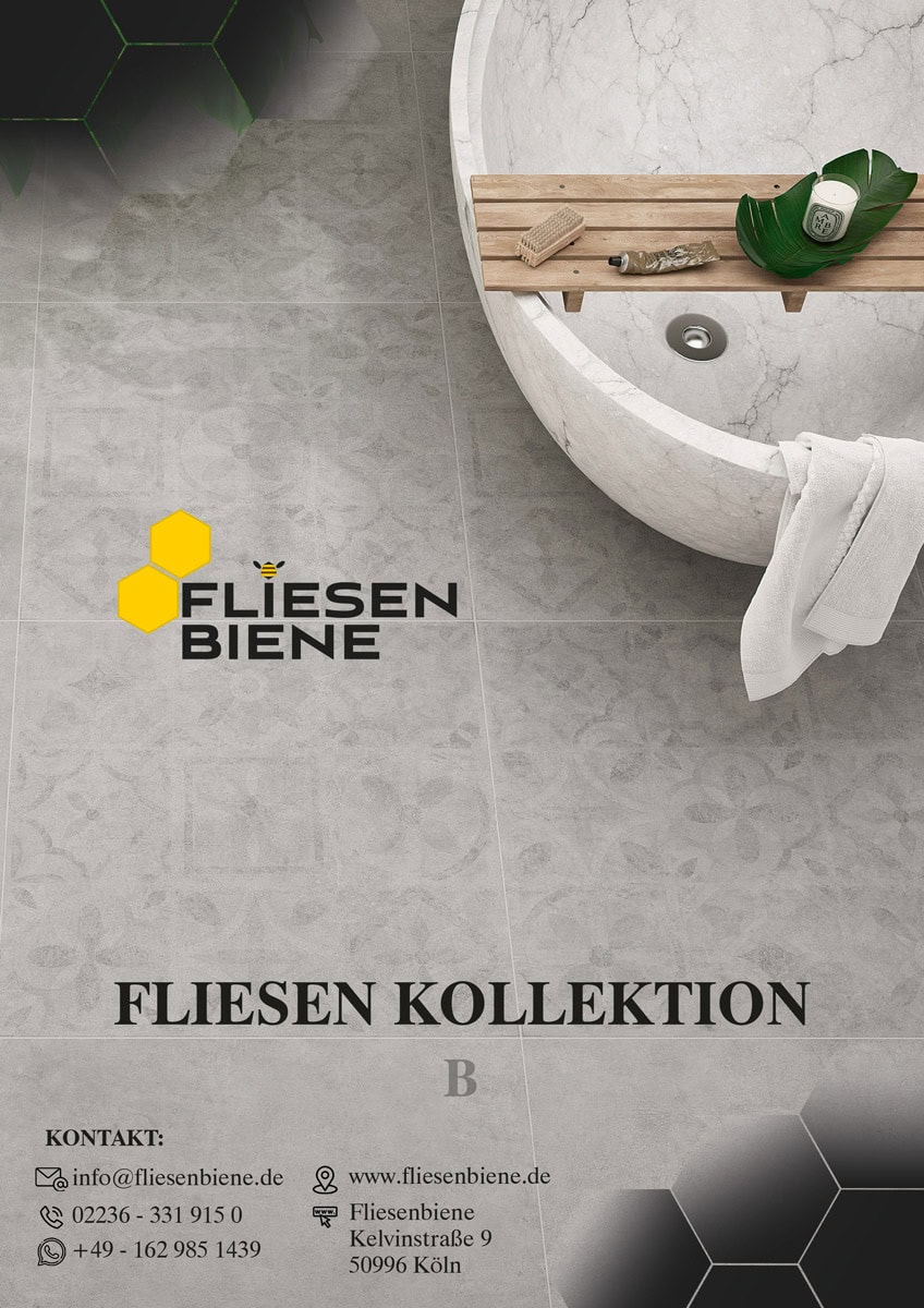 Eine luxuriöse, graue Badezimmerumgebung mit einer runden weißen Badewanne und grüner Dekoration.